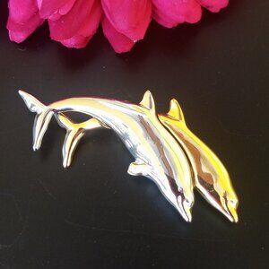 Swimming dolphins two-tone brooch pin